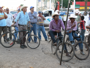 Life continues as usual in the plaza at the Jesuit mission in Yaqui town of Pótam 