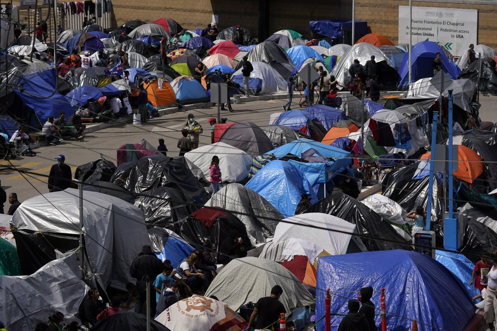Tent camp of migrants at El Chaparral Port of Entry, Tijuana, Mexico - March 2021
